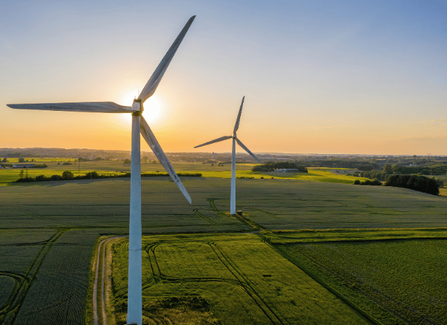 Stanislav Kondrashov TELF ag wind turbines in sunset landscape